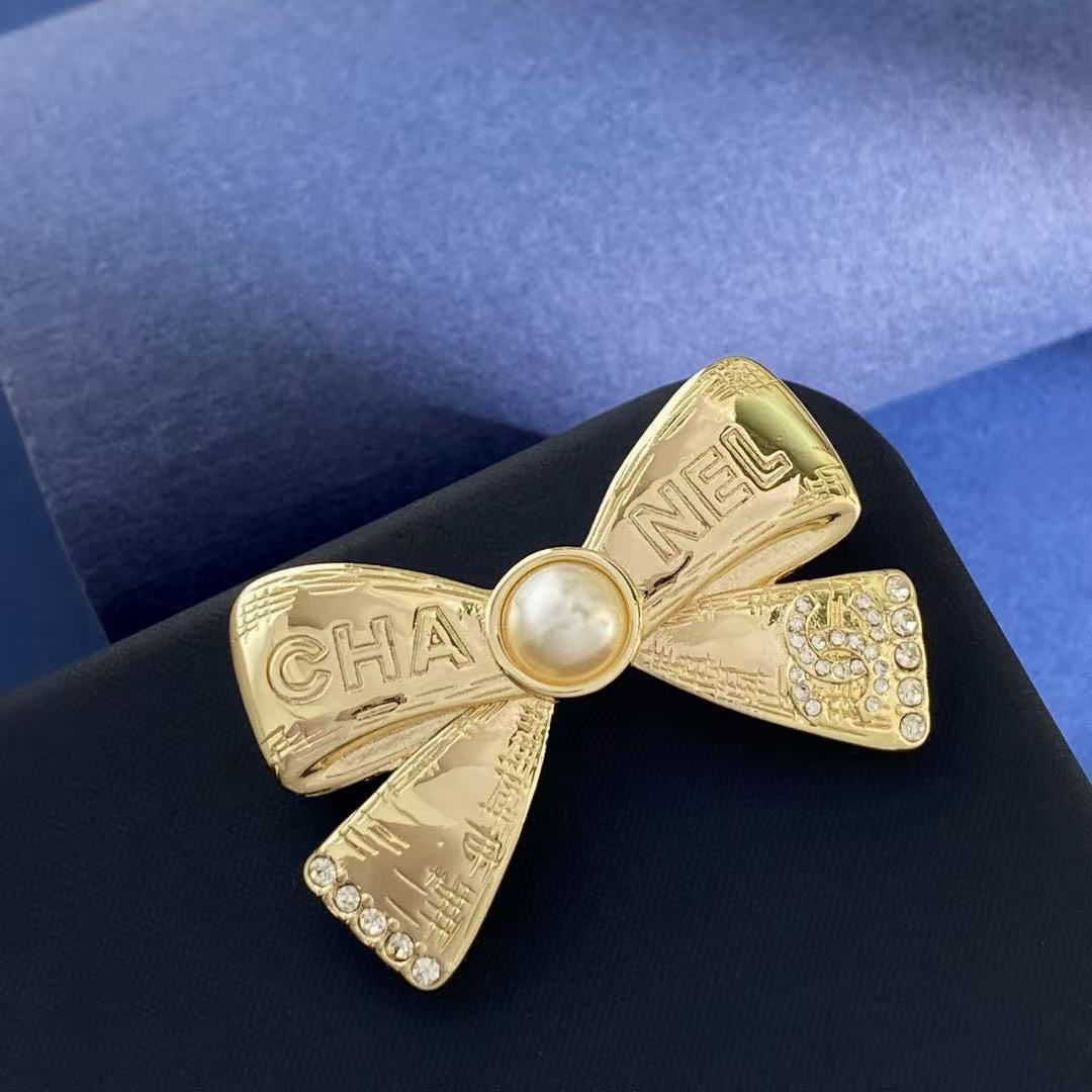 Bow Brooch in Polished Metal-Tone main product view
