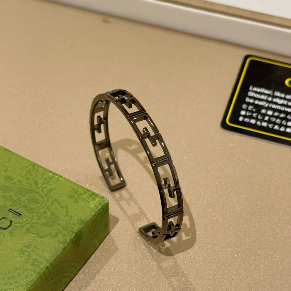 Double-G Emblem Bangle in Polished Metal-Tone – Design 025 main product view