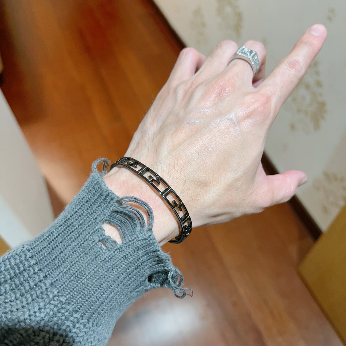 Double-G Emblem Bangle in Polished Metal-Tone – Design 025 styled product view