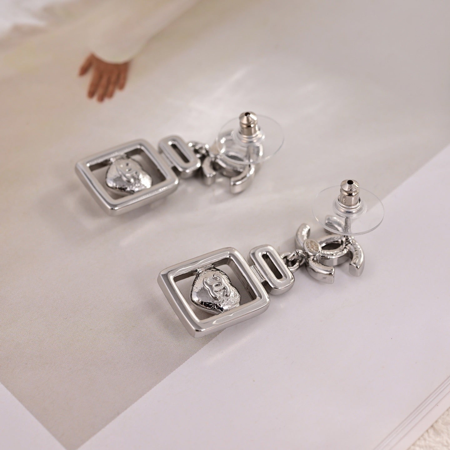 Signature Emblem Stud Earrings in Polished Metal-Tone – Design 056 side detail