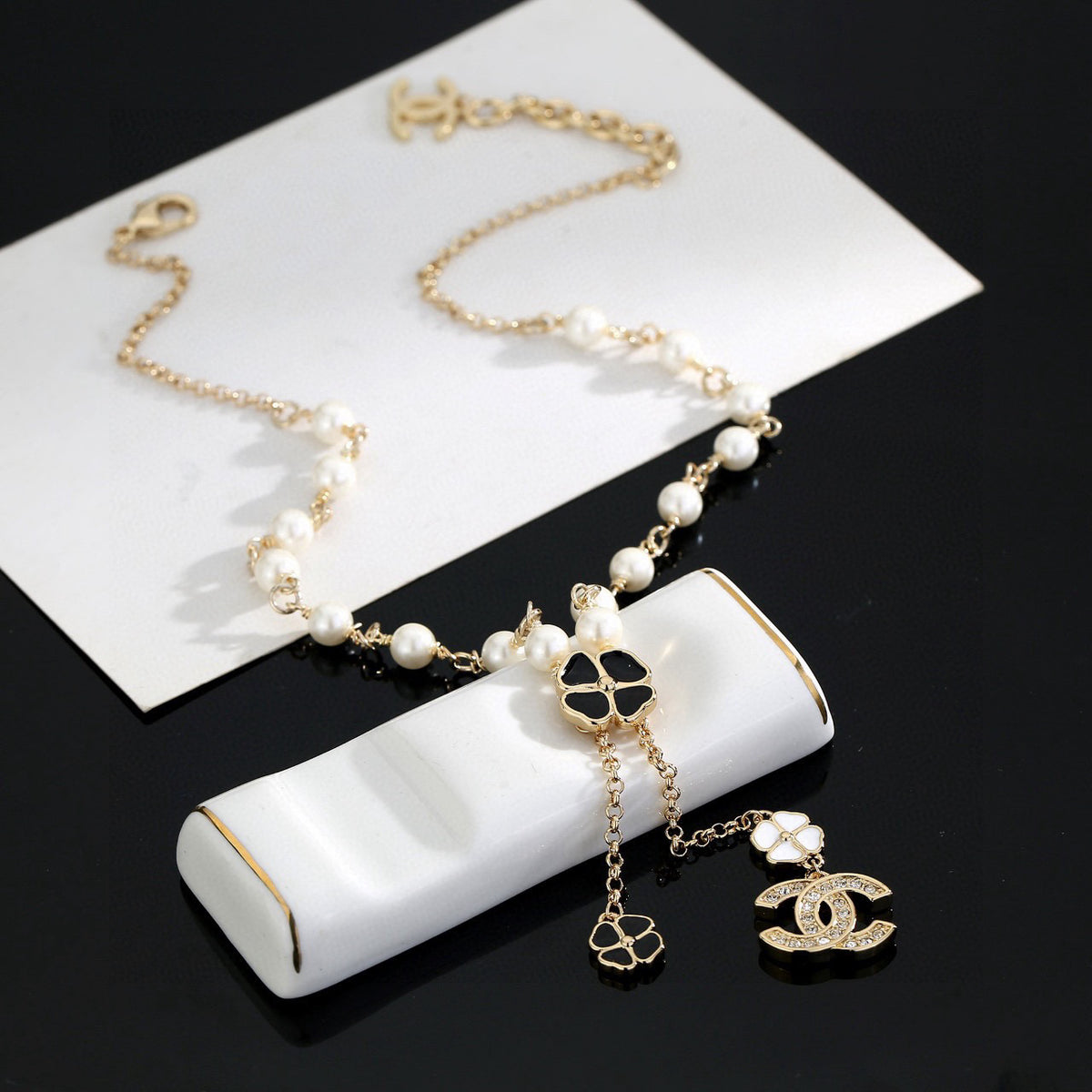 Double-C Emblem Pearl-Detail Pendant Necklace – Pearl Detail – Design 063 styled product view