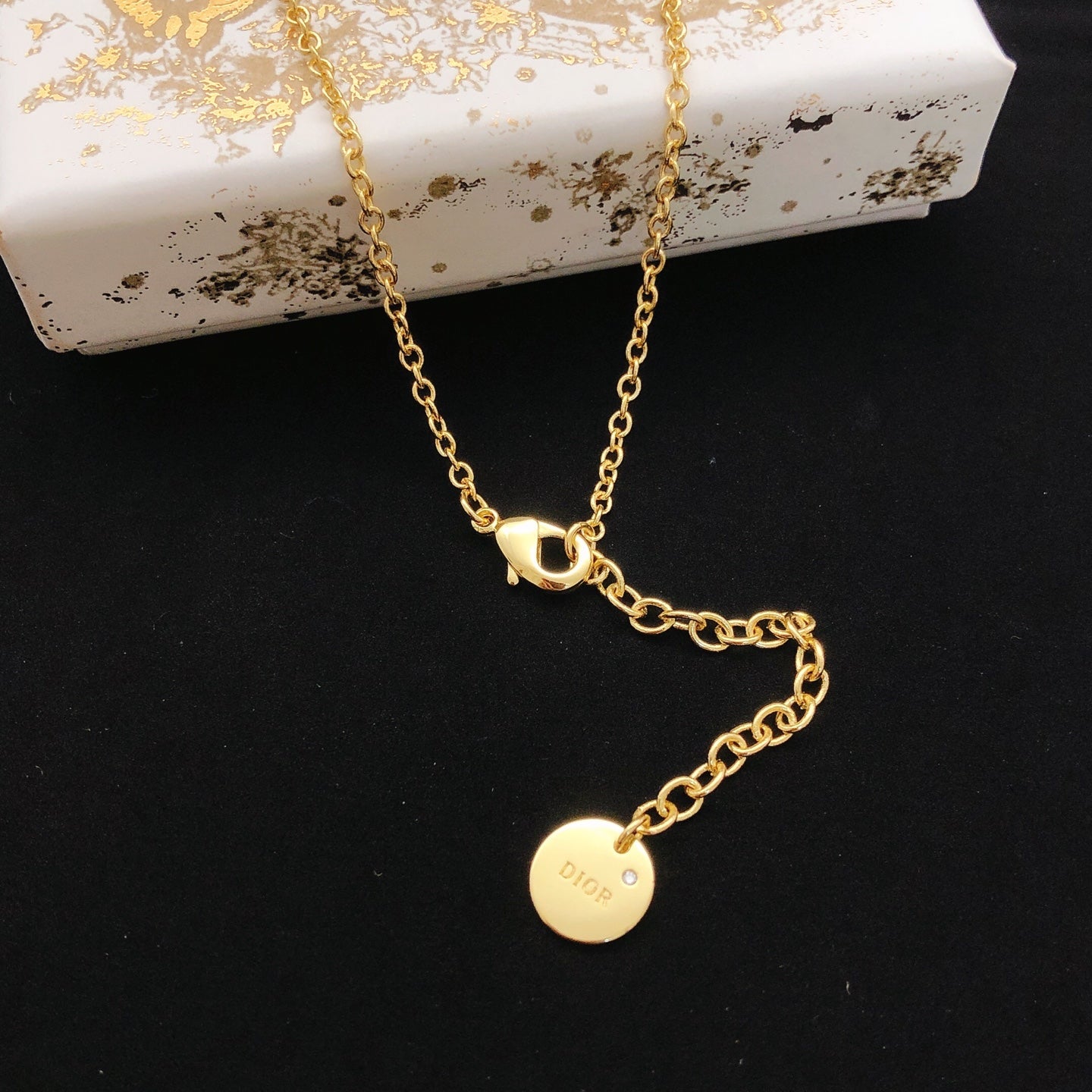 Graphic Letter Motif Pendant Necklace in Black-Tone front view