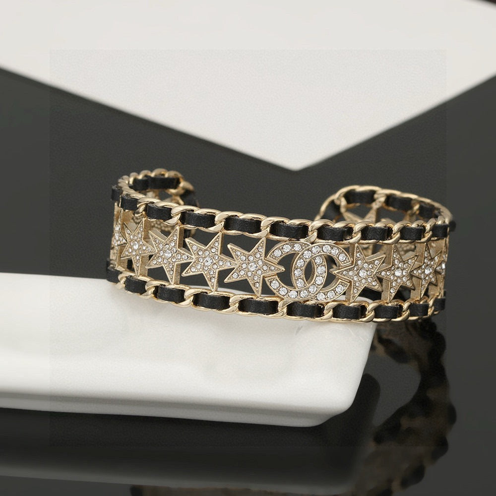 Signature Emblem Bangle in Polished Metal-Tone – Black Detail – Design 003 front product view