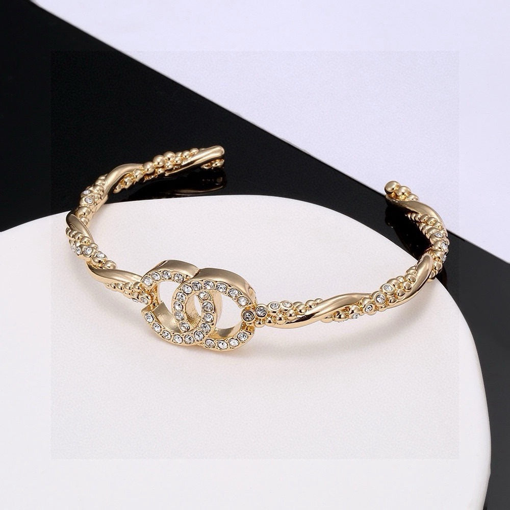 Signature Emblem Bangle in Polished Metal-Tone – Design 021 main product view