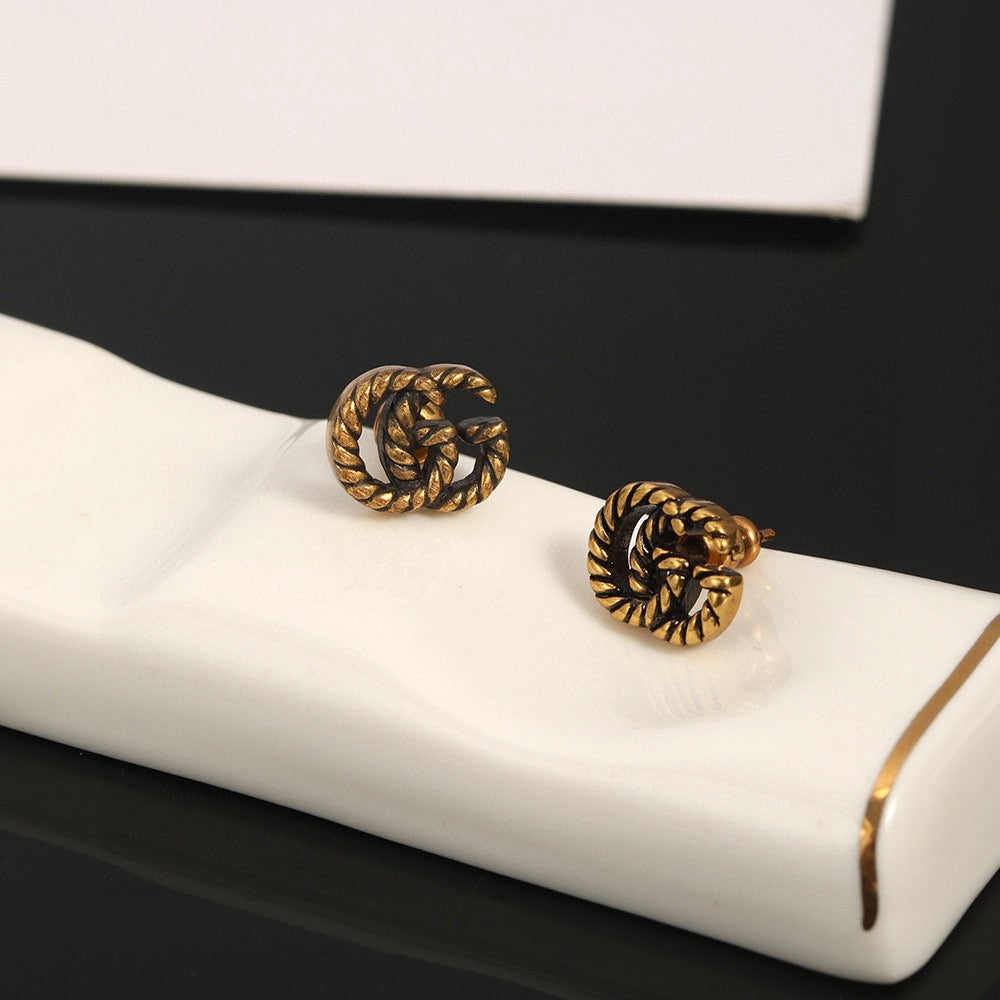 Geometric Emblem Stud Earrings in Polished Metal-Tone – Design 033 front product view