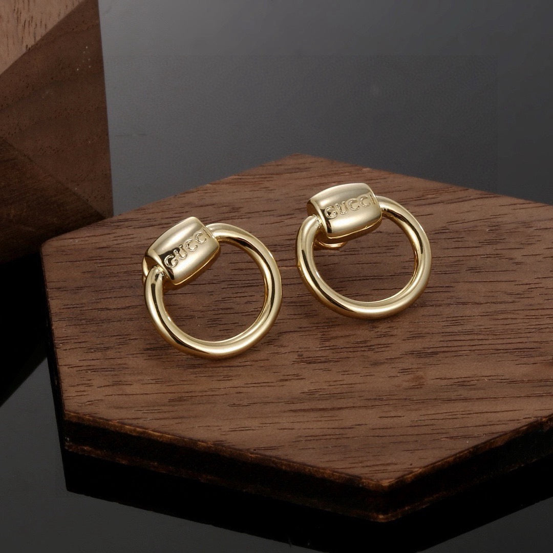 Geometric Emblem Stud Earrings in Polished Metal-Tone – Design 032 front product view