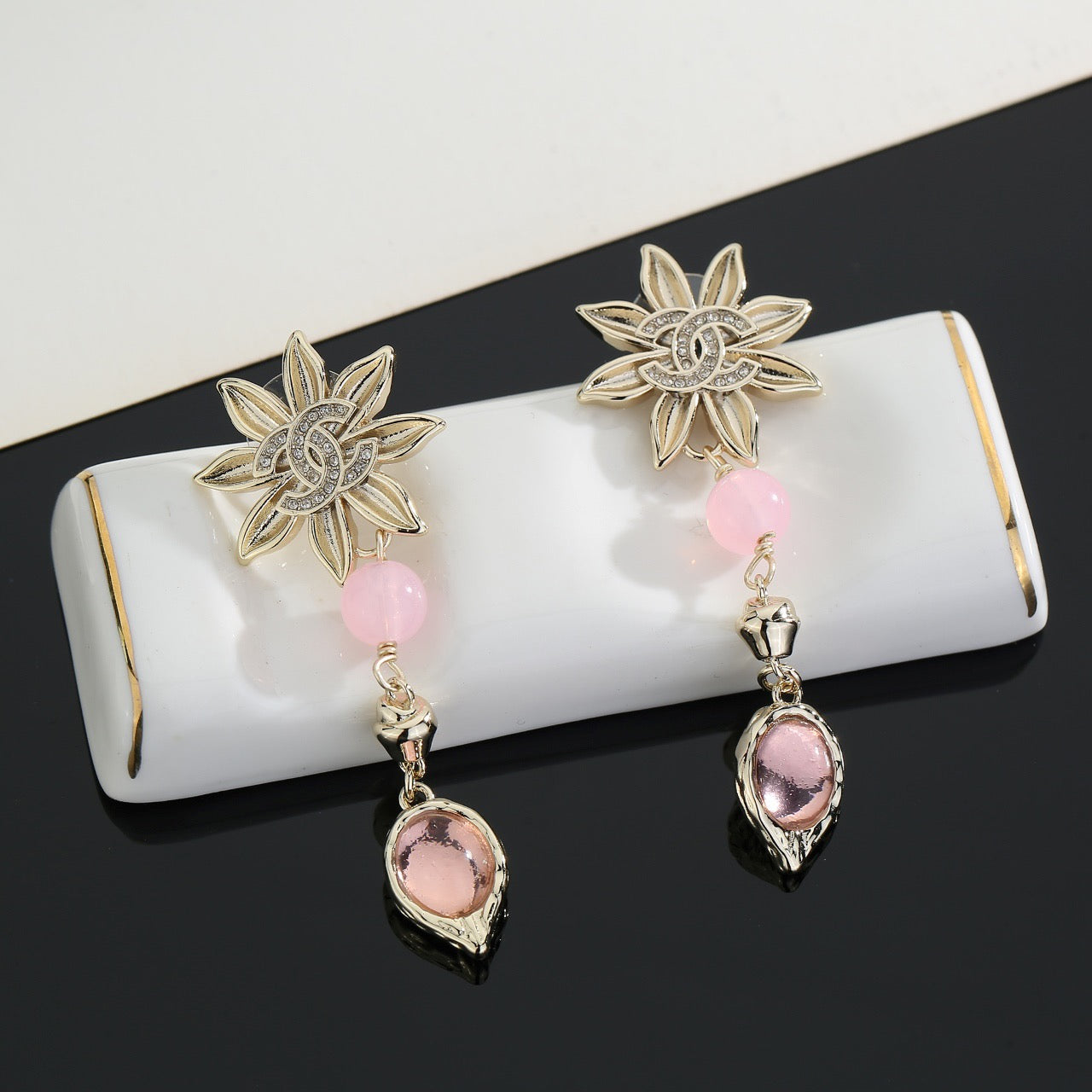 Double-C Emblem Stud Earrings in Gold-Tone – Design 019 close-up detail
