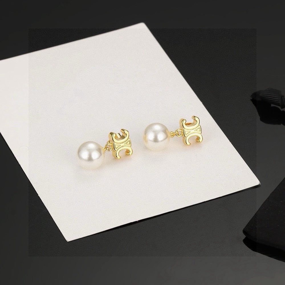 Triomphe-Inspired Emblem Pearl-Detail Stud Earrings – Pearl Detail close-up view