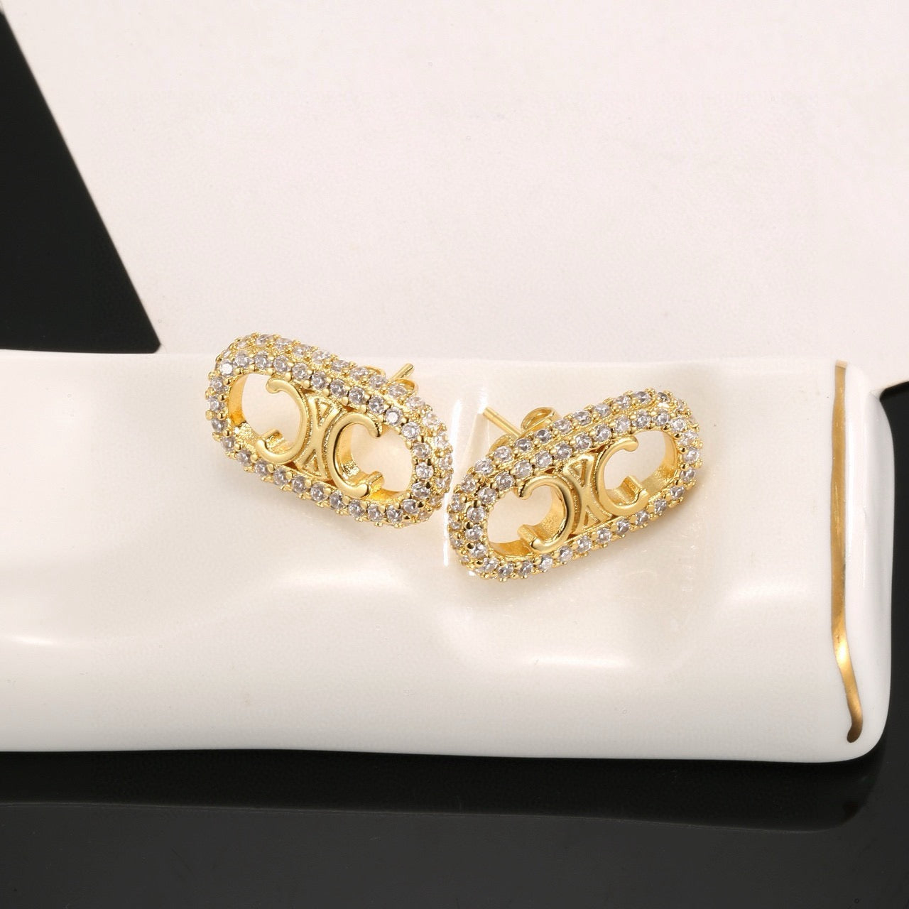 Signature Emblem Stud Earrings in Gold-Tone – Design 04 detail view