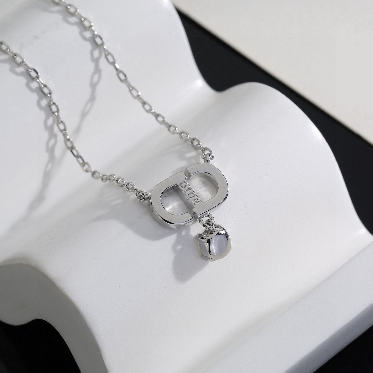 Graphic Letter Motif Pendant Necklace in Polished Metal-Tone – Design 018 detail view