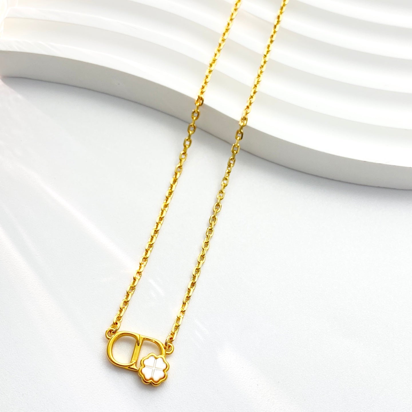 Graphic Letter Motif Pendant Necklace in Gold-Tone – Design 002 detail view