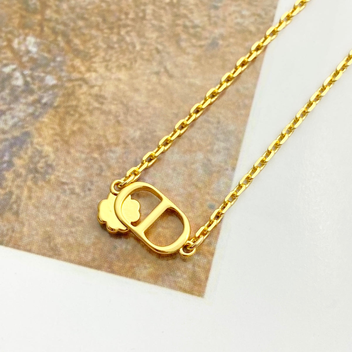 Graphic Letter Motif Statement Bracelet in Gold-Tone side detail