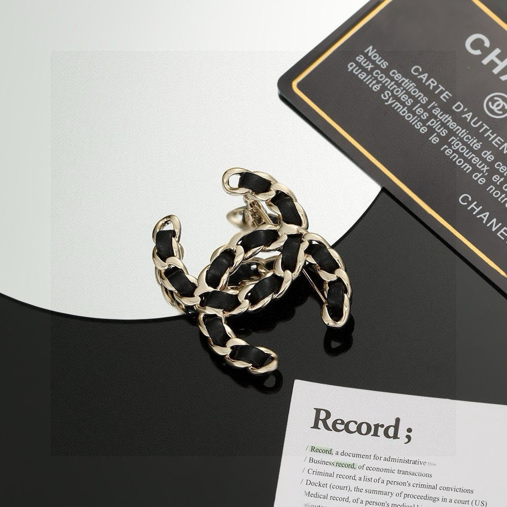 Signature Emblem Brooch in Polished Metal-Tone – Black Detail – Design 002 main product view