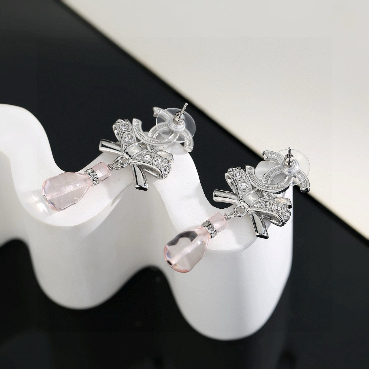 Double-C Emblem Crystal-Accent Stud Earrings – Design 038 close-up detail
