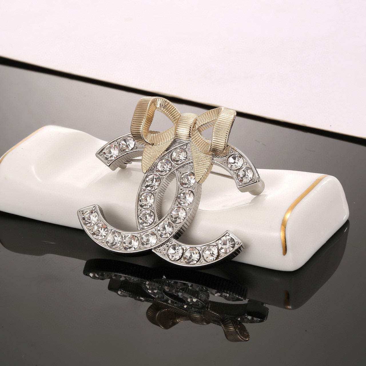 Signature Emblem Brooch in Polished Metal-Tone – Design 031 close-up detail