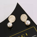 Geometric Emblem Stud Earrings in Polished Metal-Tone – Design 035 main product view