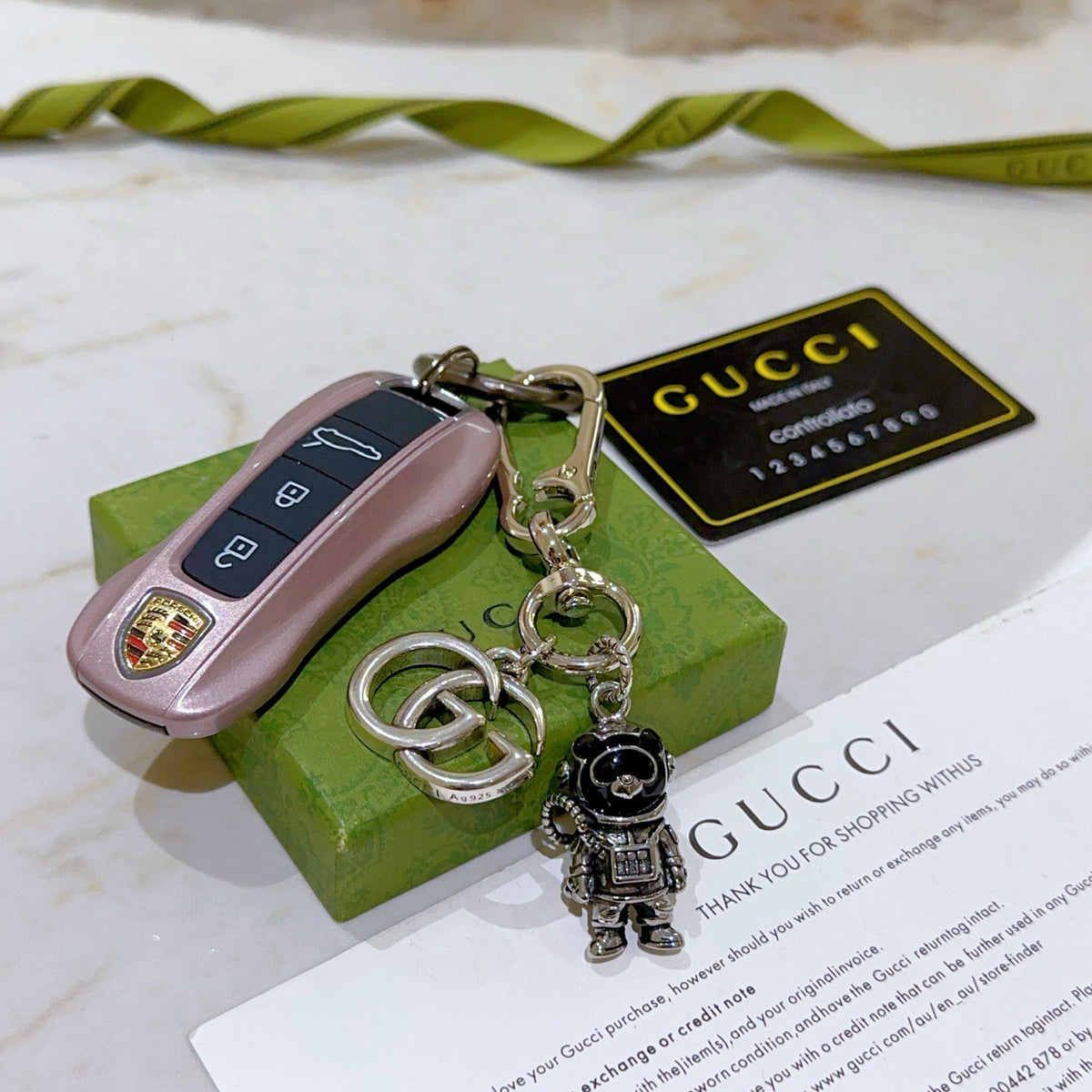 Double-G Emblem Keychain in Polished Metal-Tone – Design 029 detail view
