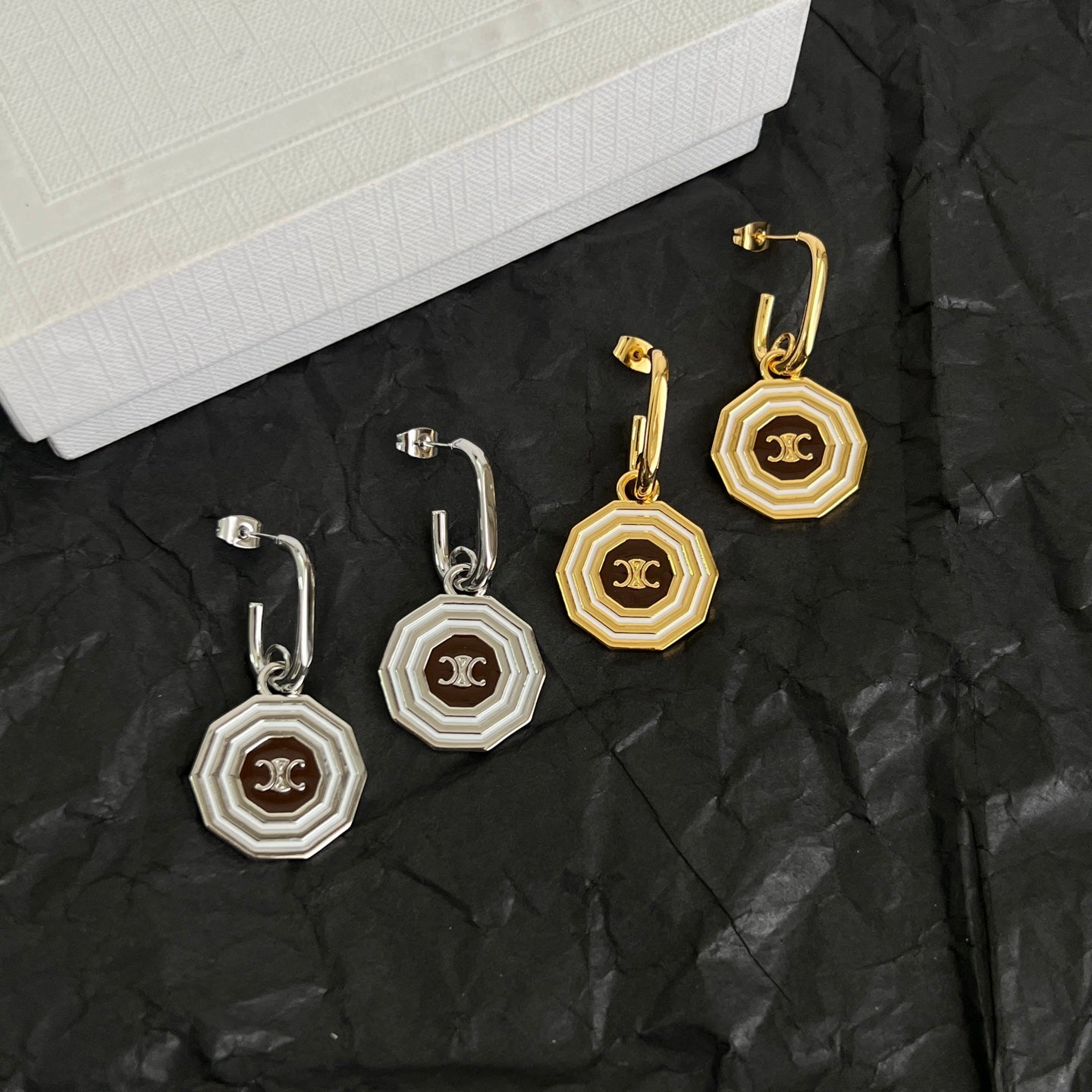 Signature Emblem Stud Earrings in Polished Metal-Tone – Design 03 front view