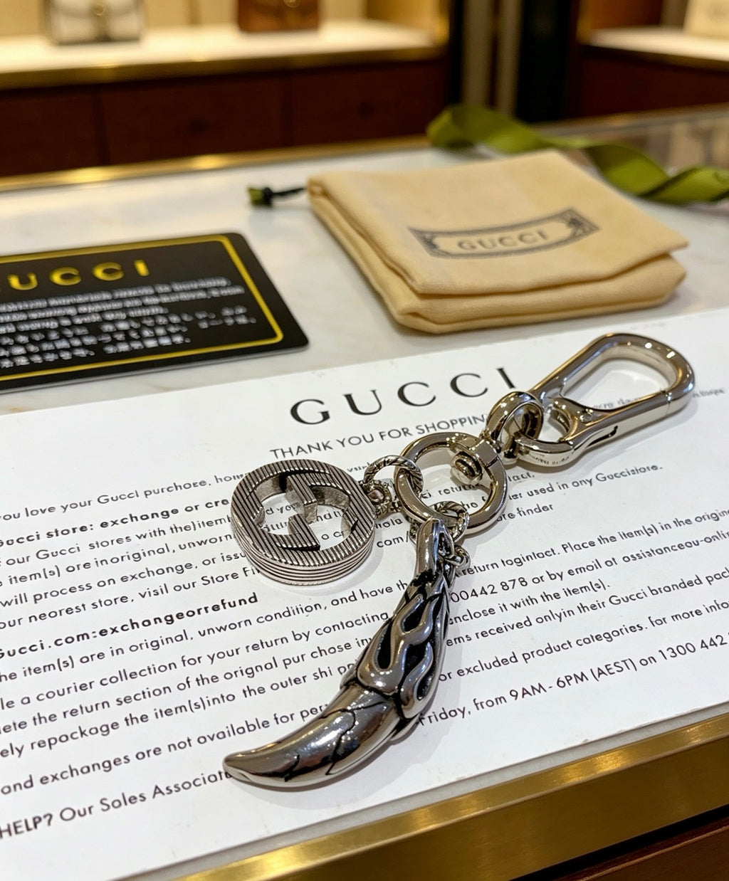 Double-G Emblem Keychain in Polished Metal-Tone – Design 027 detail view
