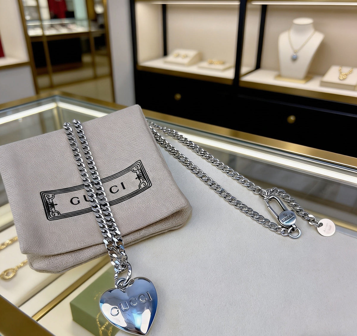 Double-G Emblem Pendant Necklace in Polished Metal-Tone – Design 134 close-up detail