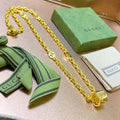 Double-G Emblem Pendant Necklace in Polished Metal-Tone – Vintage Detail – Design 034 main product view