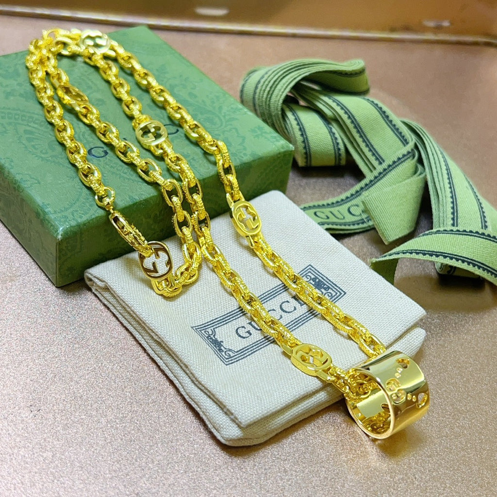 Double-G Emblem Pendant Necklace in Polished Metal-Tone – Vintage Detail – Design 034 close-up detail