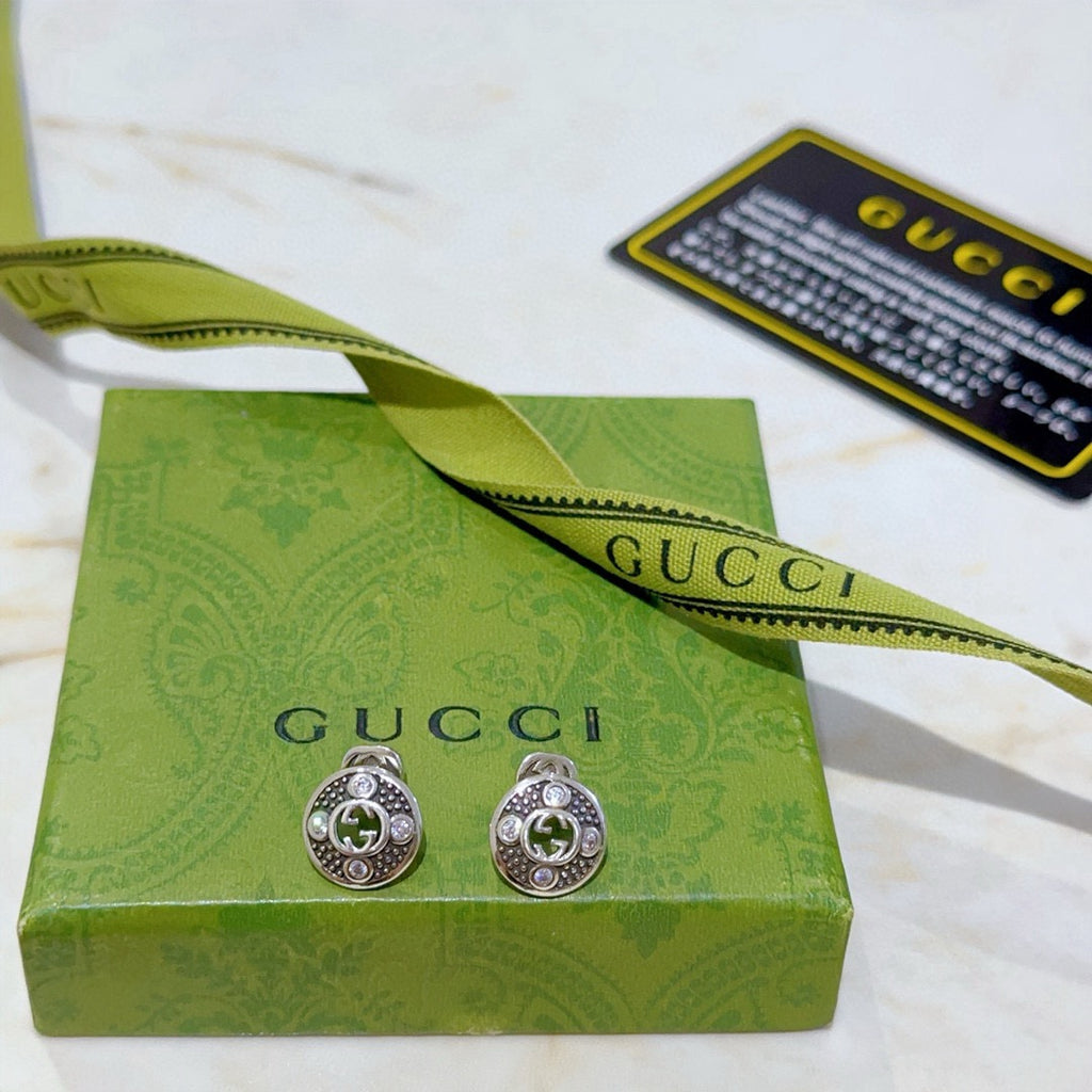 Double-G Emblem Stud Earrings in Polished Metal-Tone – Vintage Detail – Design 010 close-up detail