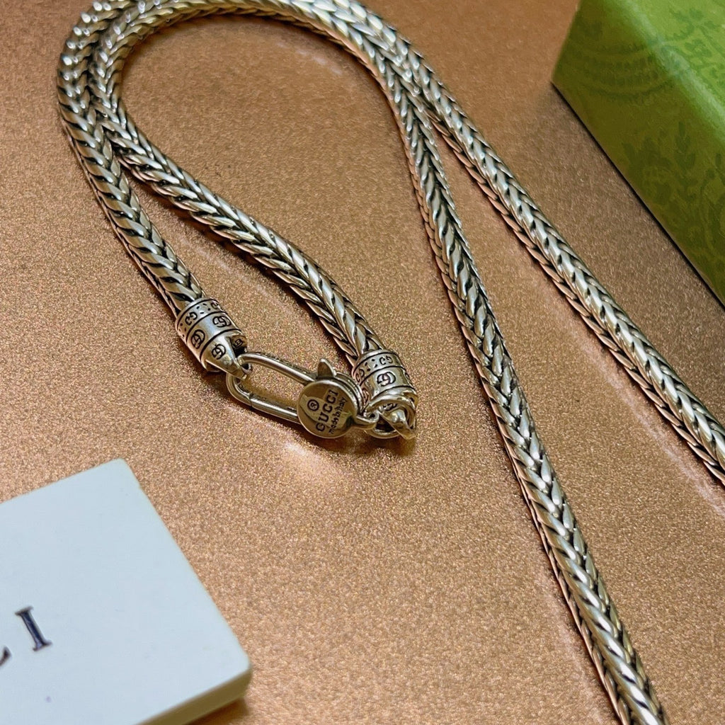 Double-G Emblem Pendant Necklace in Polished Metal-Tone – Turquoise Detail main product view
