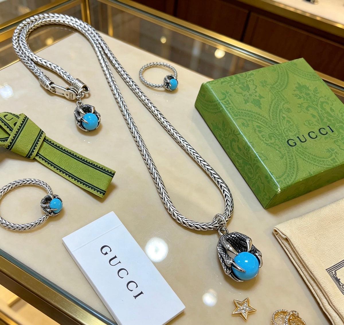 Double-G Emblem Pendant Necklace in Polished Metal-Tone – Turquoise Detail main product view