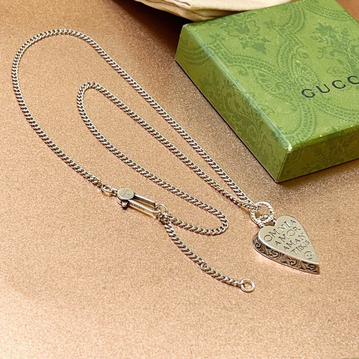 Double-G Emblem Pendant Necklace in Polished Metal-Tone – Design 130 close-up detail