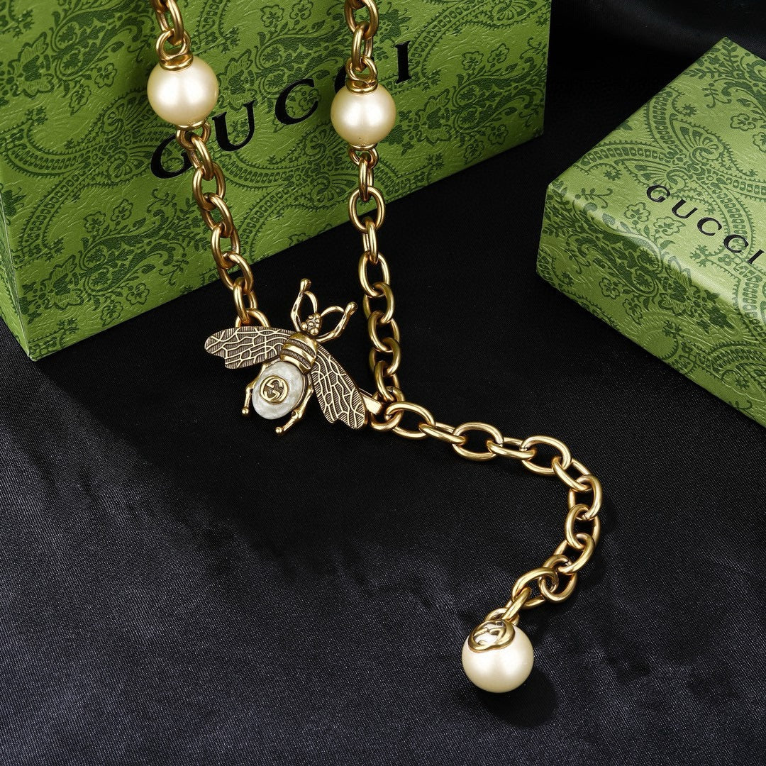 Double-G Emblem Jewelry Accessory in Polished Metal-Tone – Design 001 styled product view