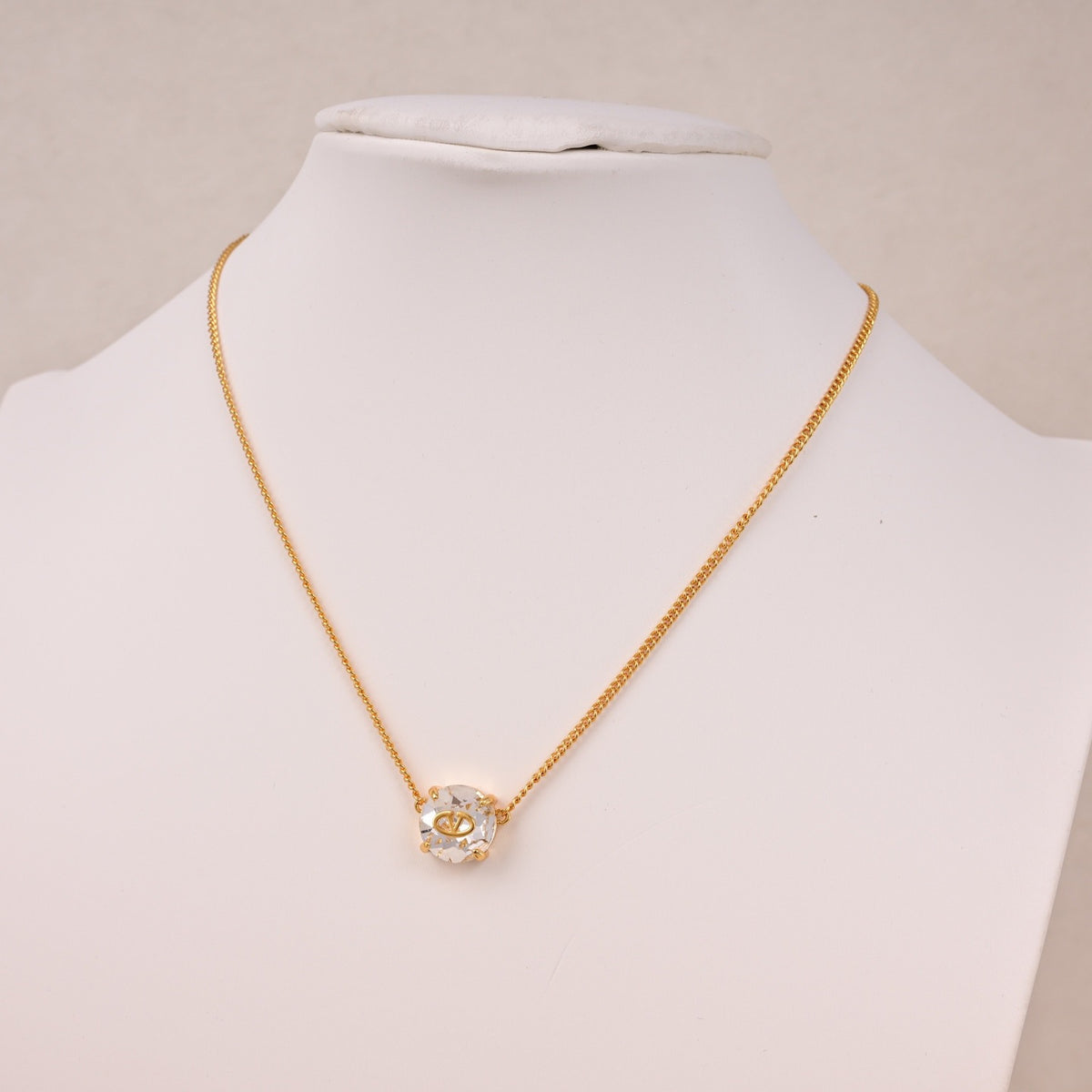 Signature Emblem Pendant Necklace in Polished Metal-Tone – Design 08 close-up view
