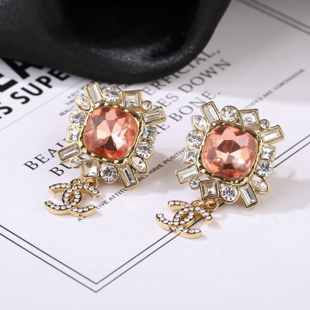 Double-C Emblem Stud Earrings in Gold-Tone – Design 025 detail view