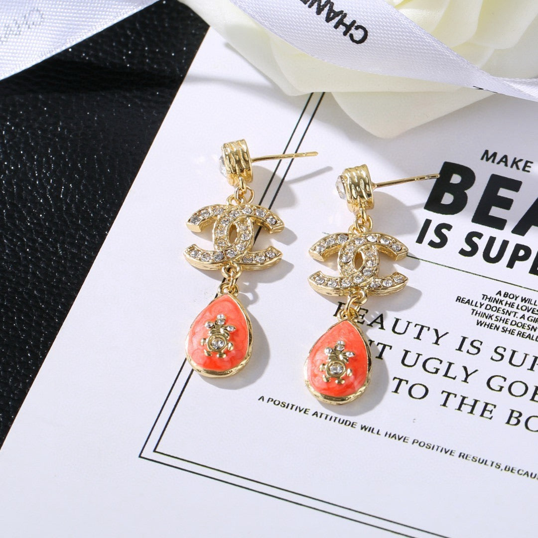 Double-C Emblem Stud Earrings in Gold-Tone – Design 024 side detail
