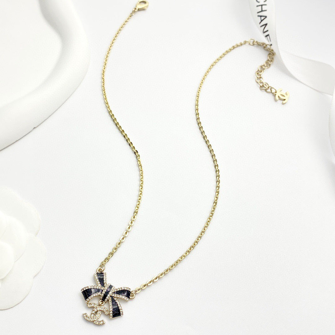 Bow Pendant Necklace in Black-Tone side detail