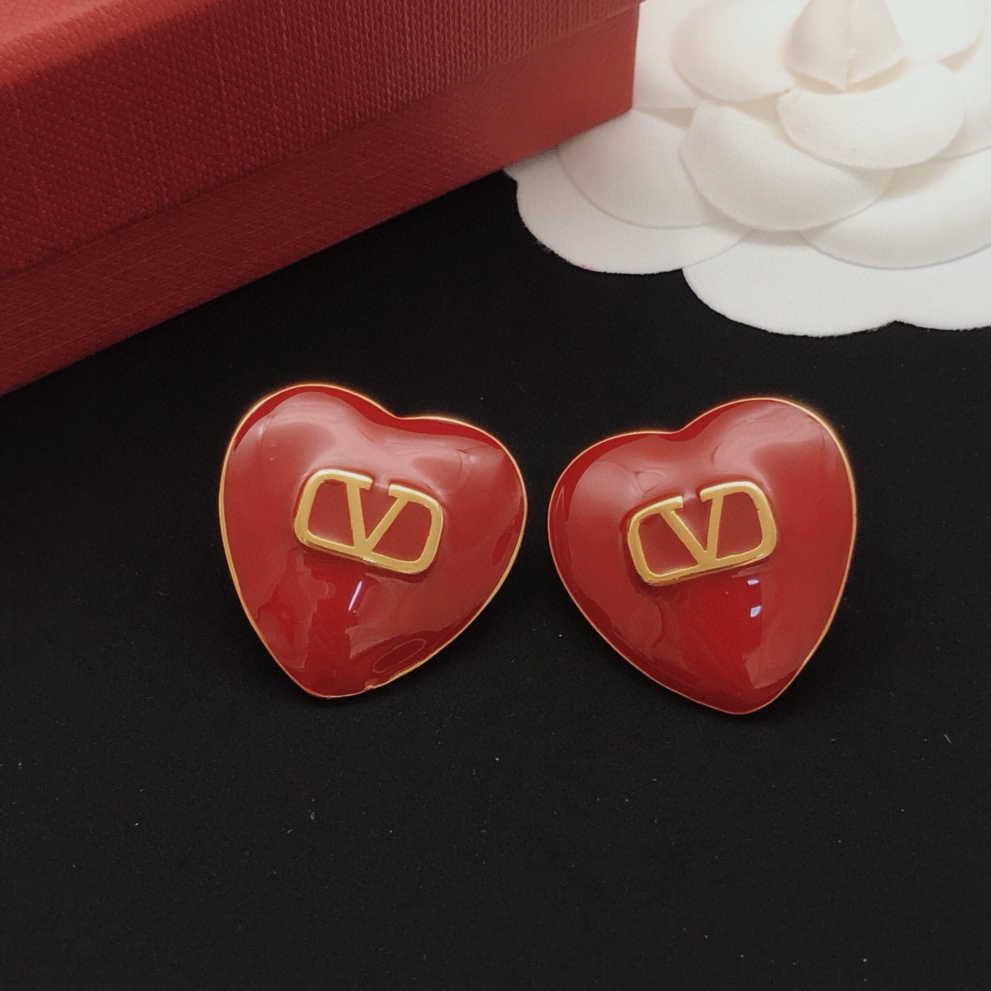 Heart Stud Earrings in Gold-Tone – Red close-up view