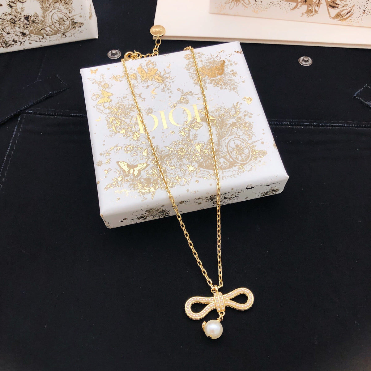Bow & Butterfly Motif Pendant Necklace in Polished Metal-Tone – Design 005 main product view