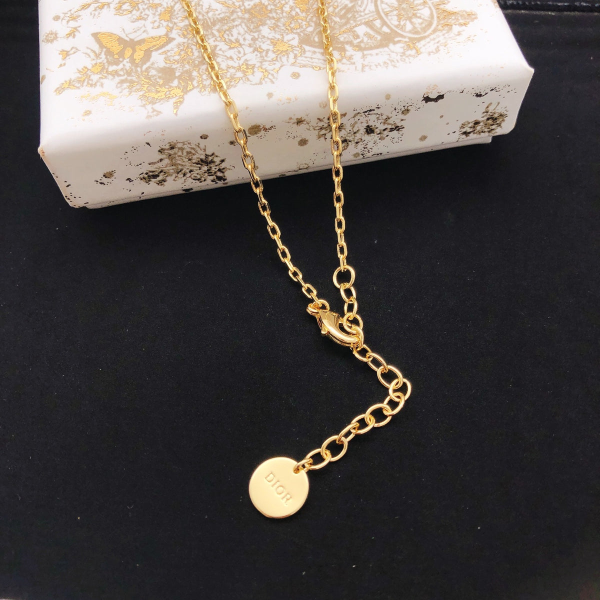 Bow & Butterfly Motif Pendant Necklace in Polished Metal-Tone – Design 005 front view
