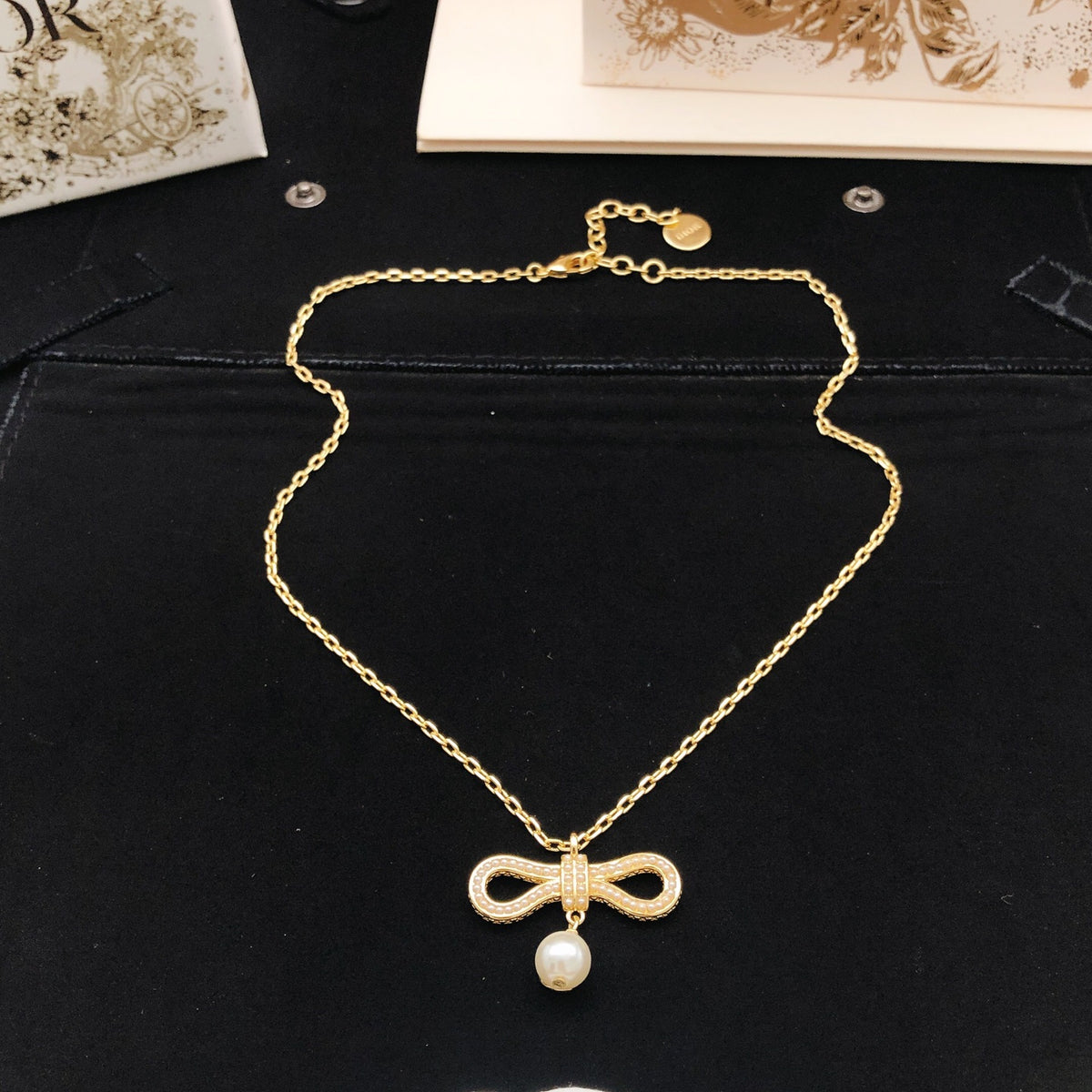 Bow & Butterfly Motif Pendant Necklace in Polished Metal-Tone – Design 005 detail view