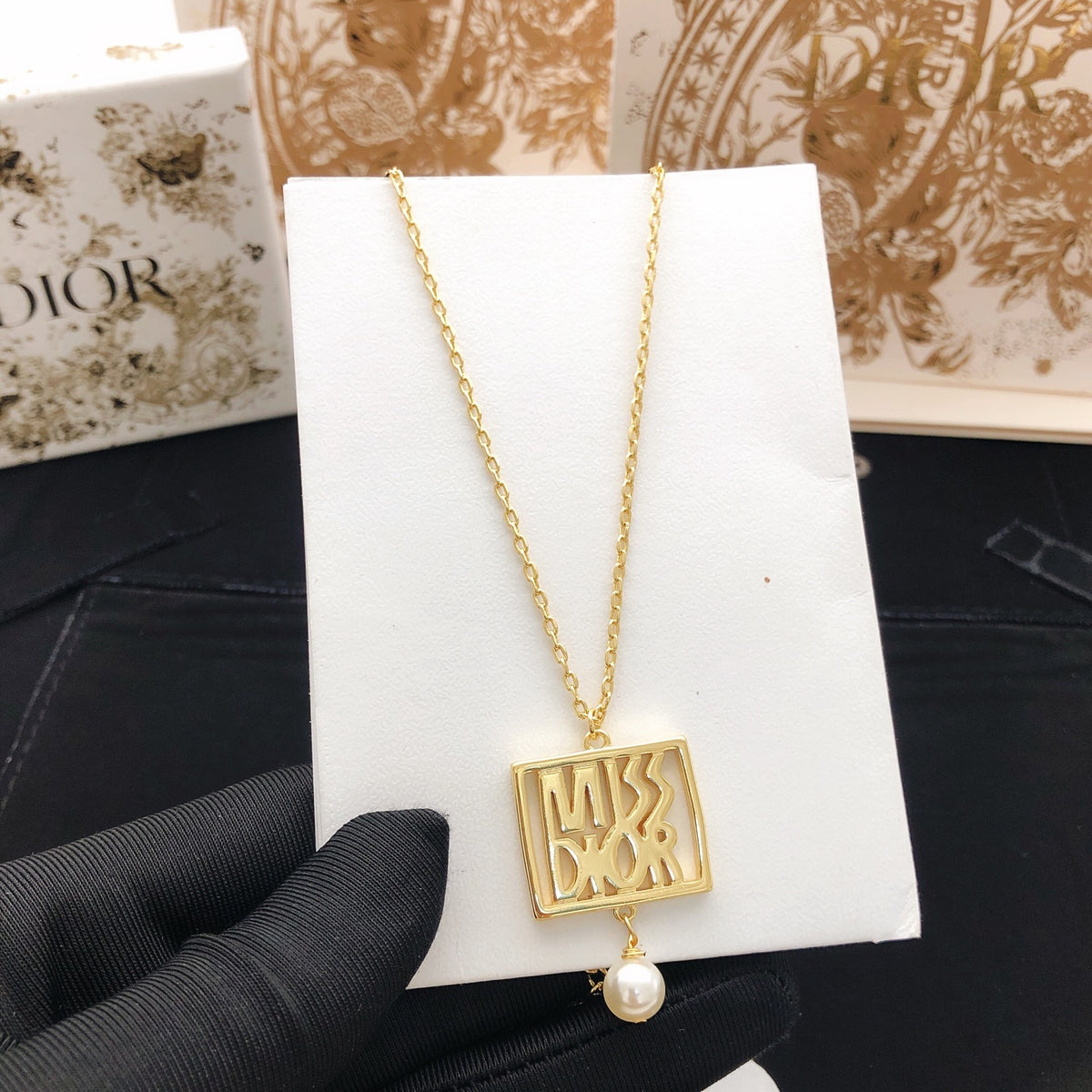 Pearl-Style Motif Pendant Necklace in Polished Metal-Tone with Pearl-Style Detail – Design 018 styled view