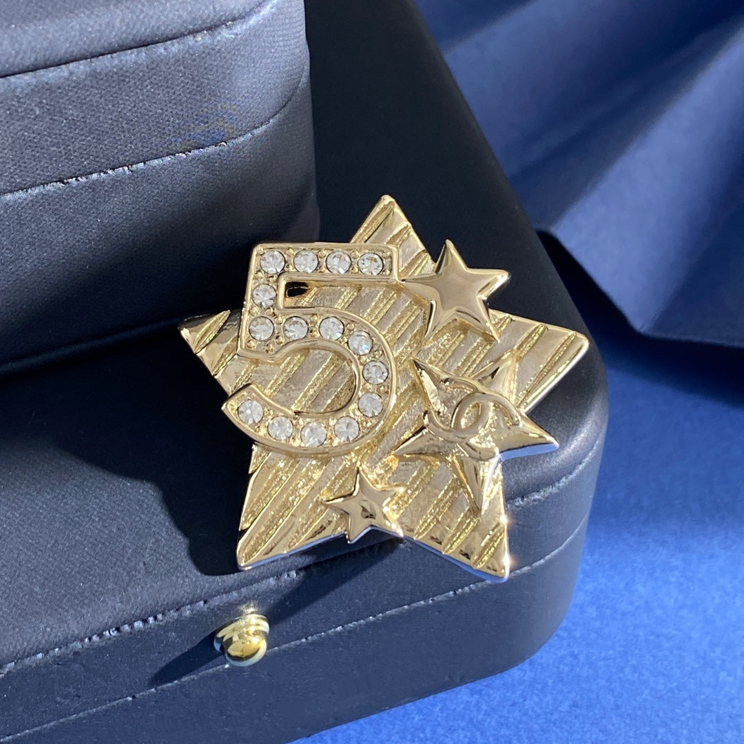 Double-C Emblem Brooch in Gold-Tone – Star Detail – Design 002 front product view
