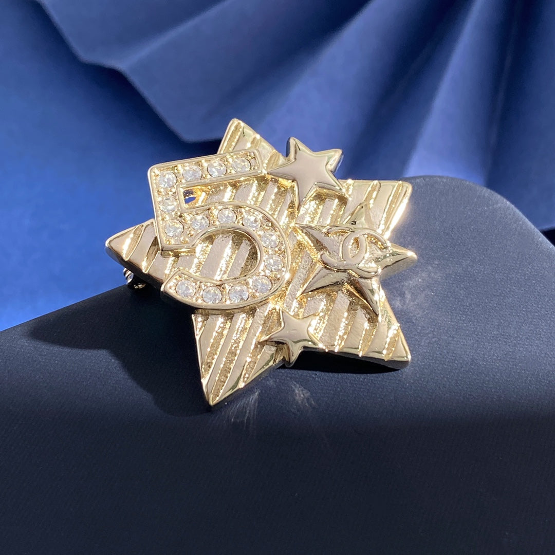 Double-C Emblem Brooch in Gold-Tone – Star Detail – Design 002 front product view