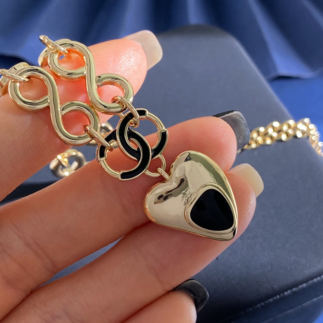 Double-C Emblem Pendant Necklace in Gold-Tone – Heart Detail – Design 002 front product view