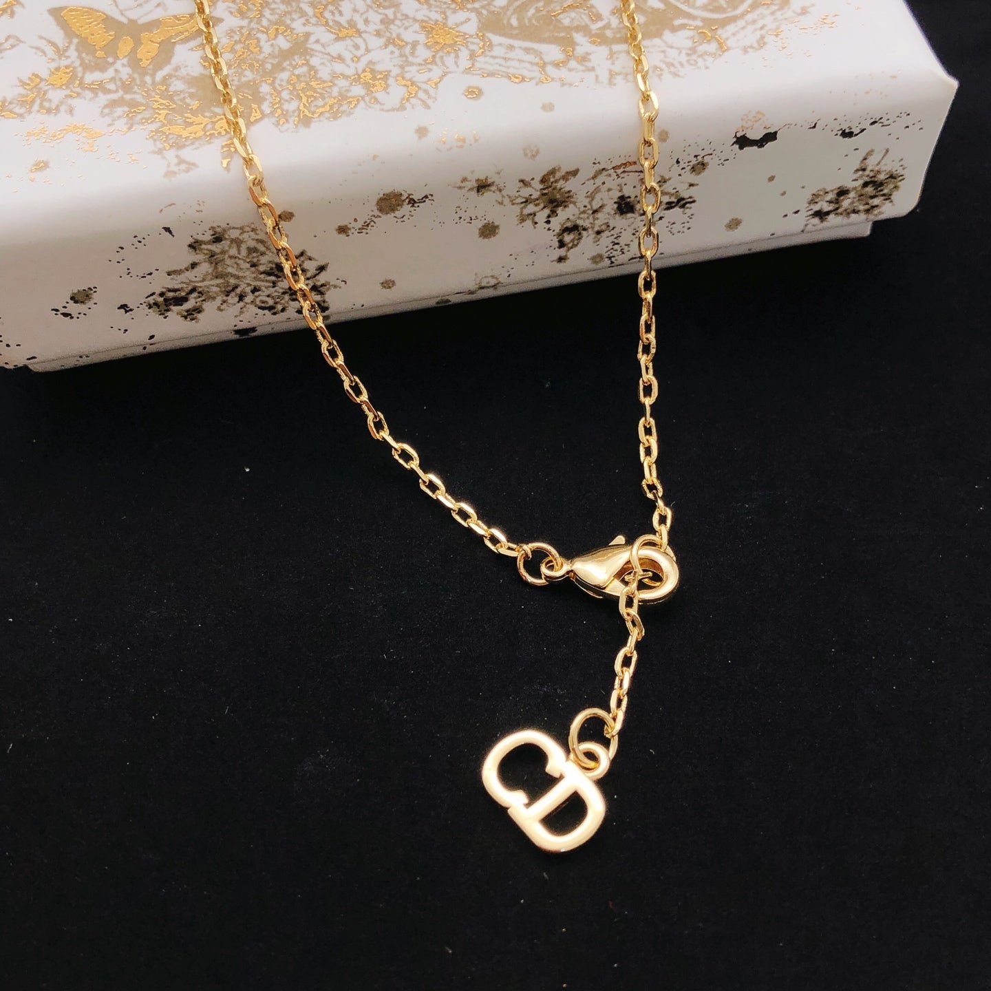 Graphic Letter Motif Pendant Necklace in Polished Metal-Tone – Design 021 front view