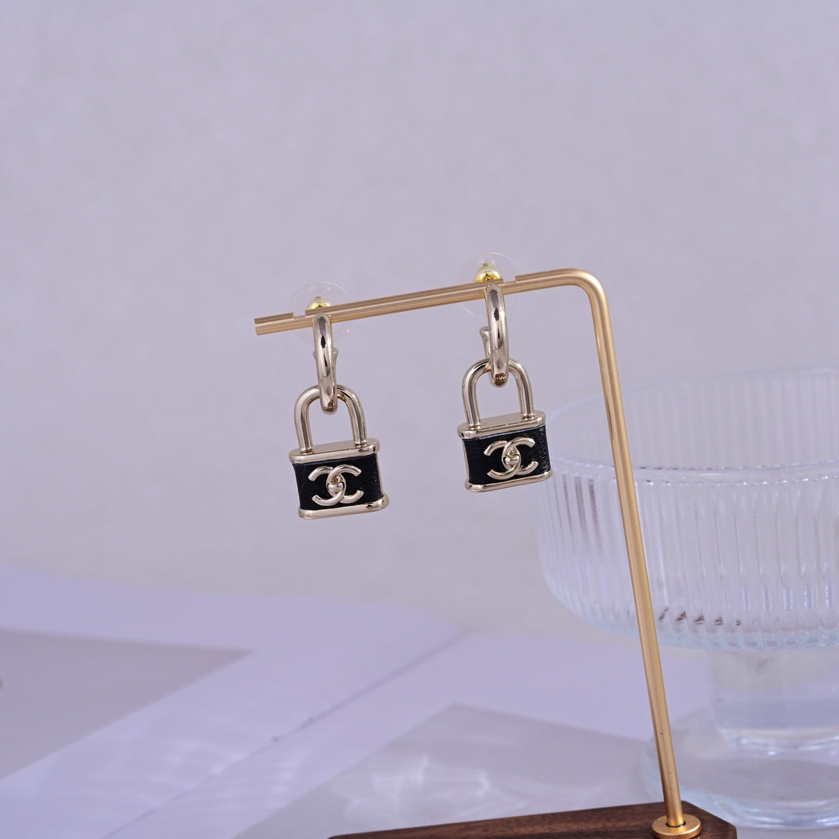 Signature Emblem Stud Earrings in Polished Metal-Tone – Design 086 close-up detail