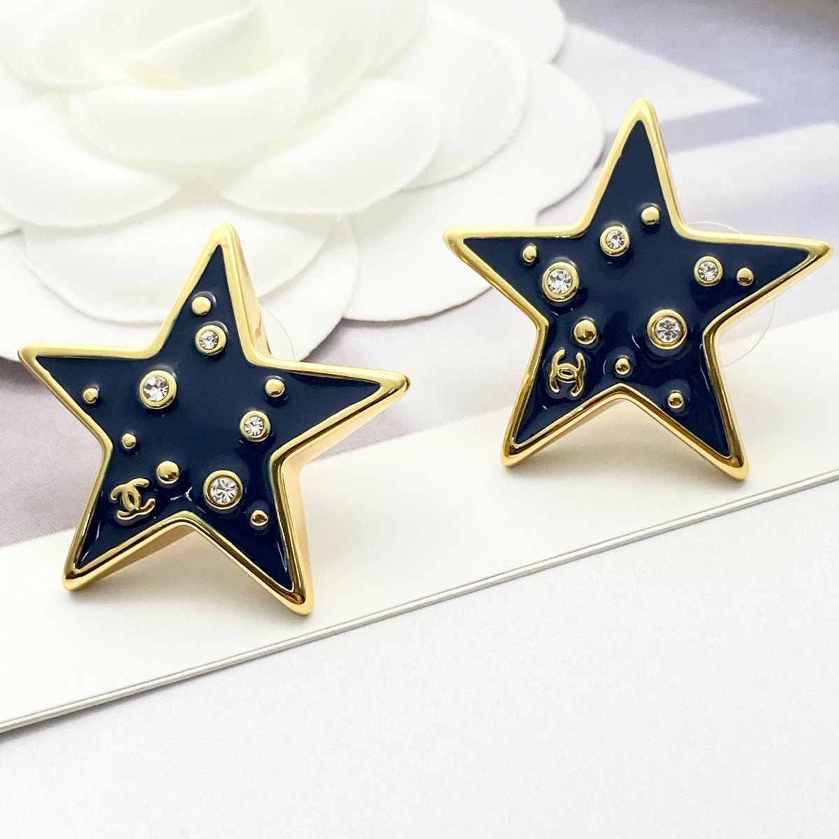 Double-C Emblem Crystal-Accent Stud Earrings – Star Detail – Design 003 close-up detail