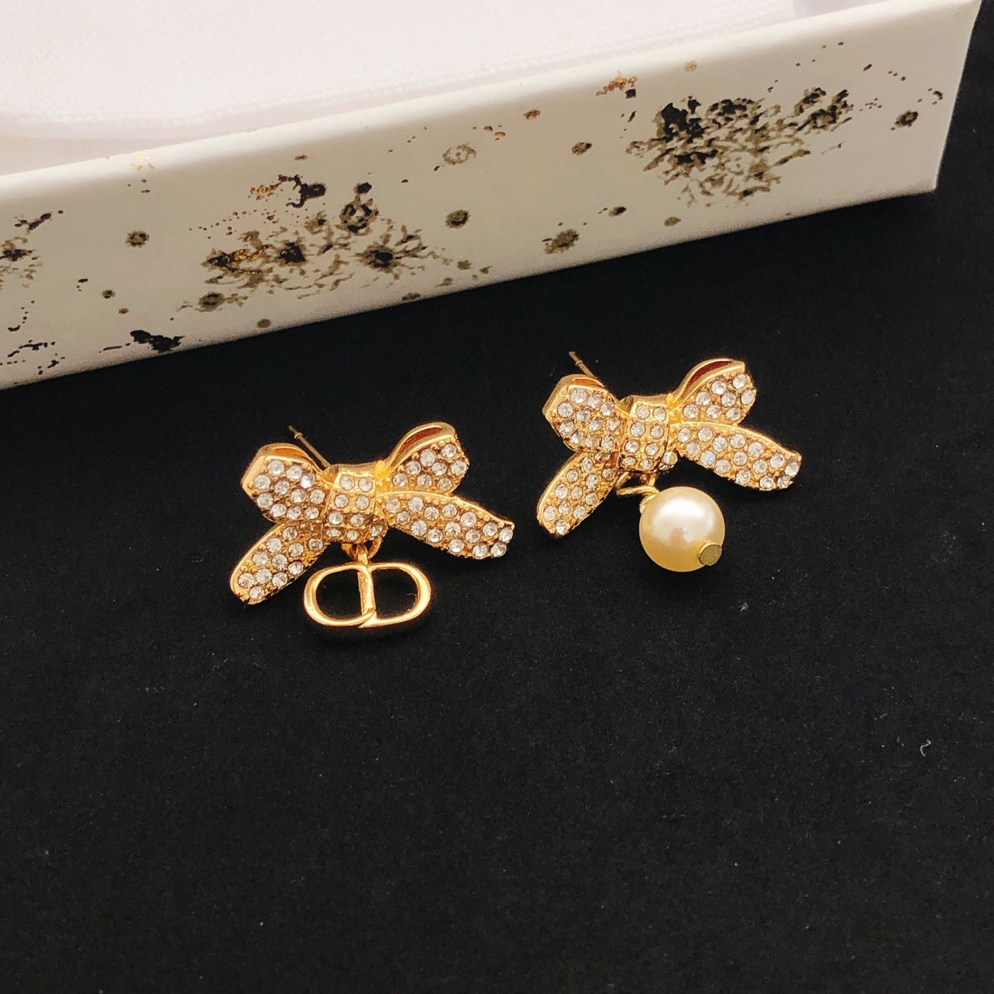 Bow & Butterfly Motif Stud Earrings in Rose-Gold-Tone side detail