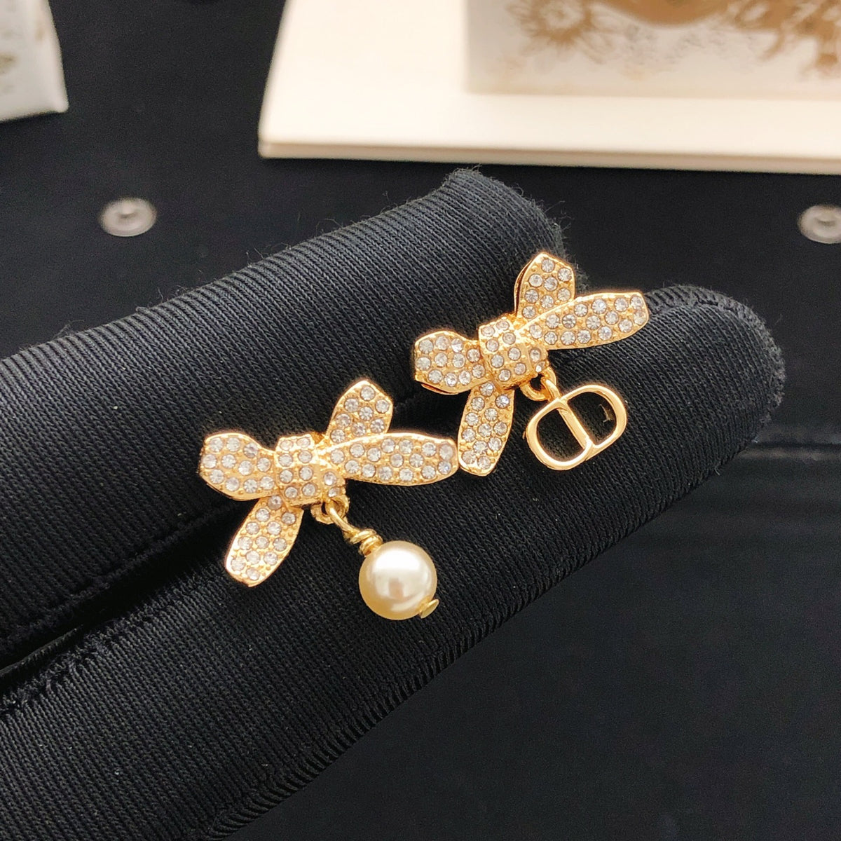 Bow & Butterfly Motif Stud Earrings in Rose-Gold-Tone front view