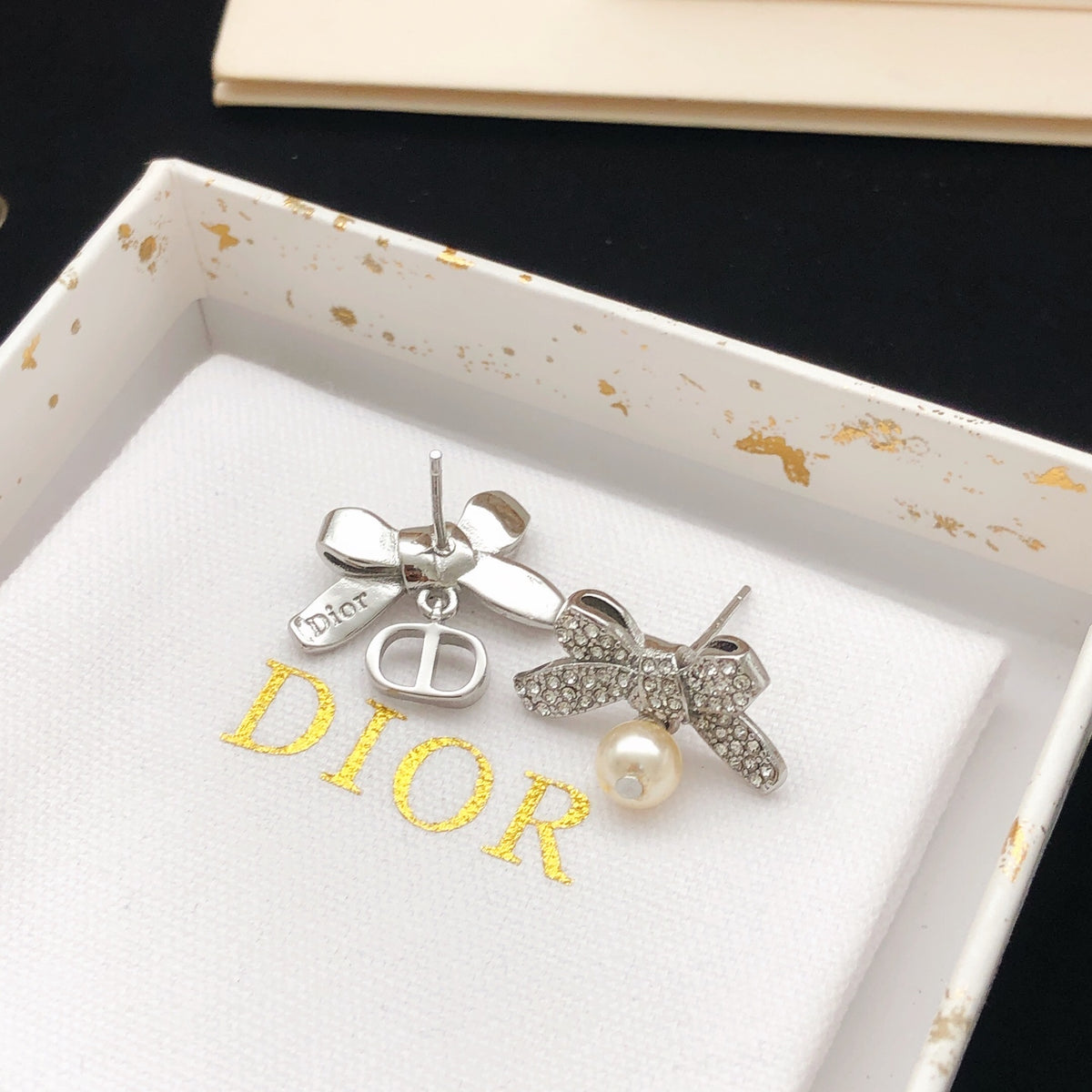 Bow & Butterfly Motif Stud Earrings in Polished Metal-Tone – Design 008 styled view