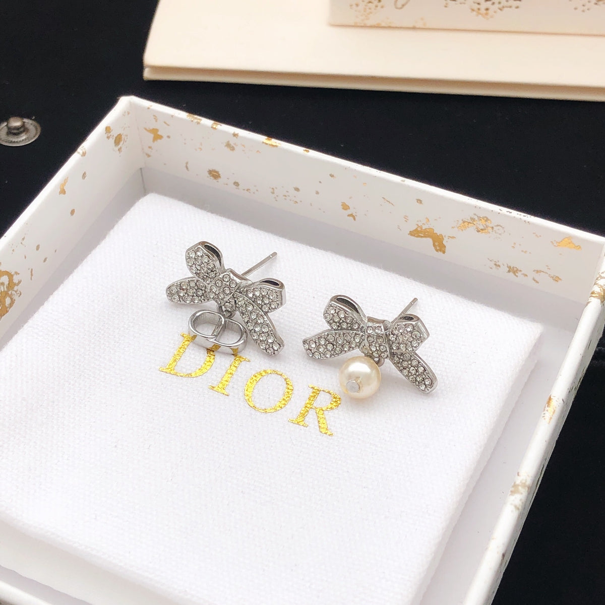 Bow & Butterfly Motif Stud Earrings in Polished Metal-Tone – Design 008 close-up detail